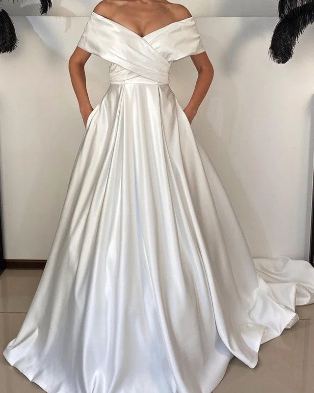 Open - back wedding dress for a sexy lookA-line Satin Off The Shoulder Wedding Dress With Pockets