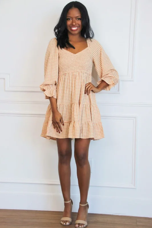 "Stylish cocktail dresses for women on a budget"Zinnia Gingham Smocked Babydoll Dress: Apricot
